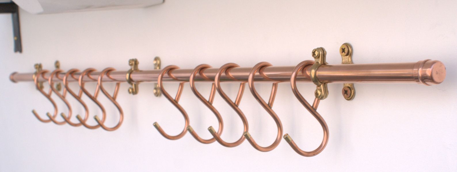 36-inch French-style copper pot rail with 10 hand-forged hooks from the forge