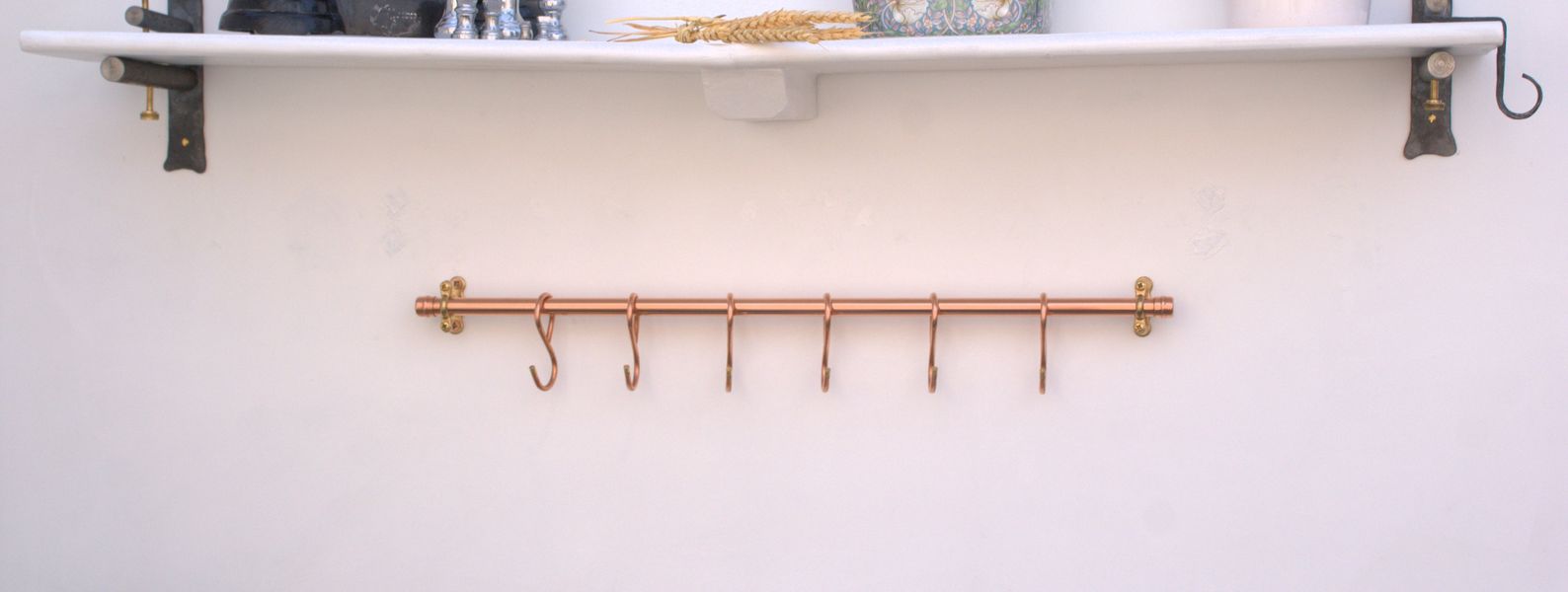 24-inch handmade copper pan rack with six French-style hooks
