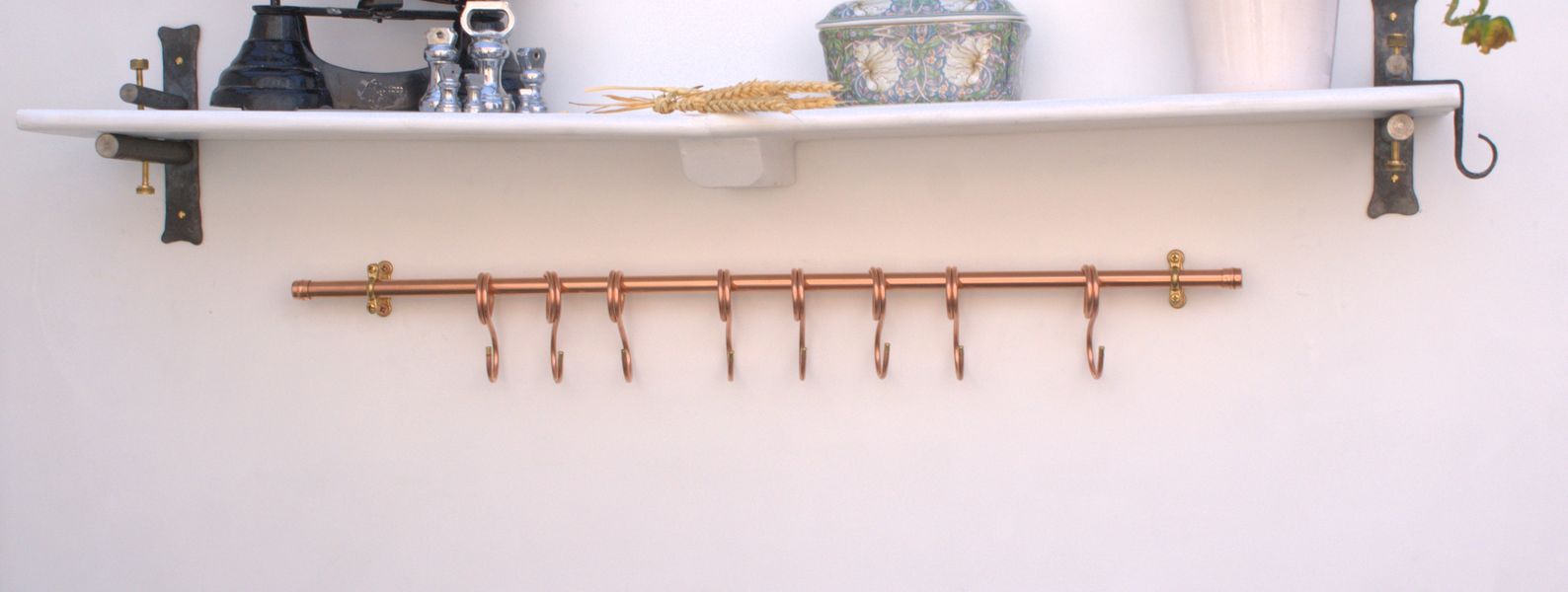 31-inch modern copper pan rack in customer kitchen