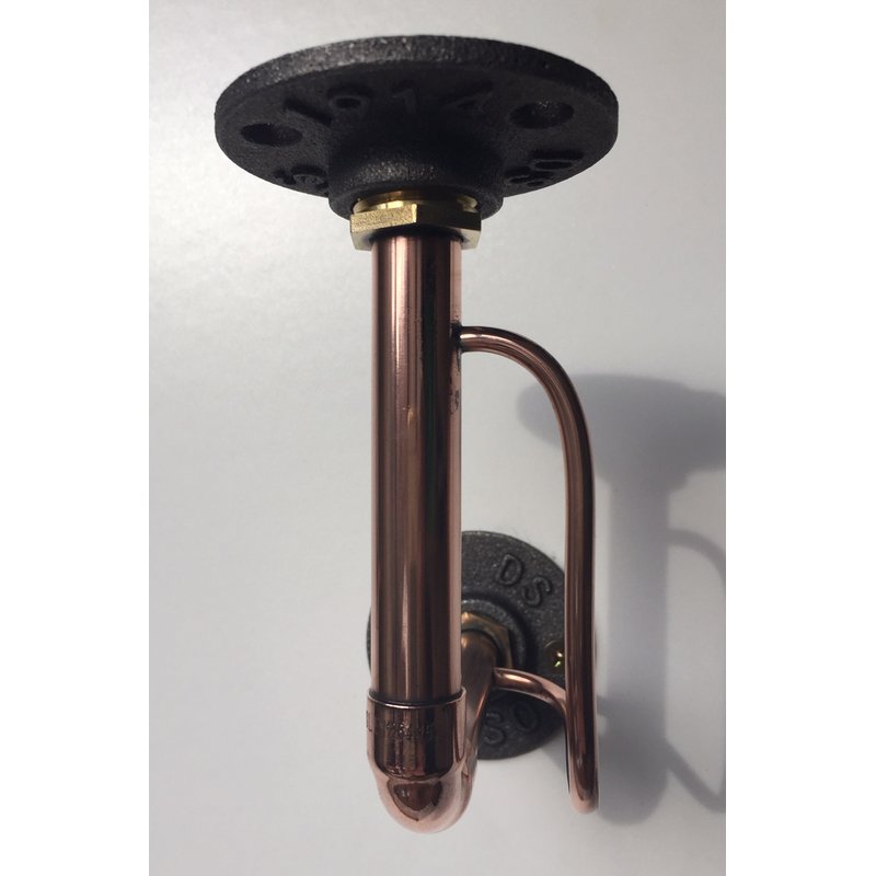 A Copper shelf bracket industrial style with auxillary piping for that New York feel by SmithWork