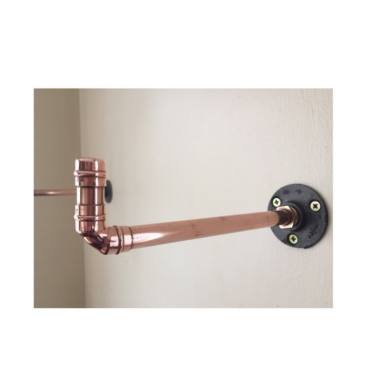 An nndustrial style copper shelf bracket with a foot end for additional strength, stability by SmithWork